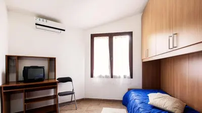 TV o dispositivi per l'intrattenimento presso Case Vacanza Baia Chia Aiosardegna