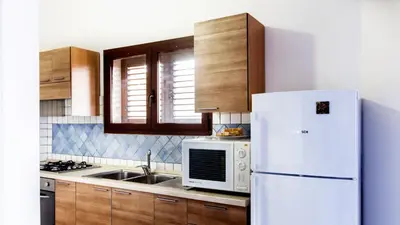 Cucina o angolo cottura di Case Vacanza Baia Chia Aiosardegna