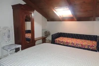 Letto o letti in una camera di SENAFER Funtana Meiga