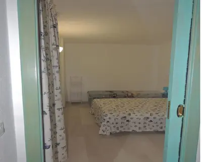 Letto o letti in una camera di SENAFER Funtana Meiga