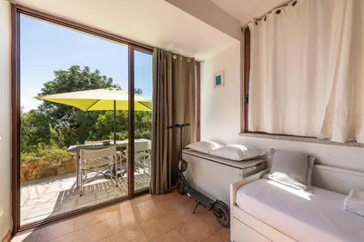 Letto o letti in una camera di Domus Moon Apartment with sea view Villasimius