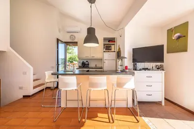 Cucina o angolo cottura di Domus Moon Apartment with sea view Villasimius