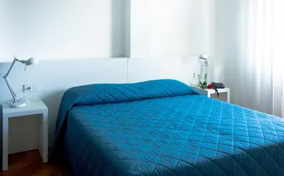 Letto o letti in una camera di Hotel Mistral