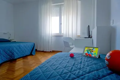 Letto o letti in una camera di Hotel Mistral