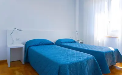 Letto o letti in una camera di Hotel Mistral