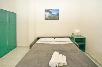Letto o letti in una camera di Su Nenneri Beach Apartment
