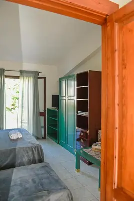 Letto o letti in una camera di Su Nenneri Beach Apartment