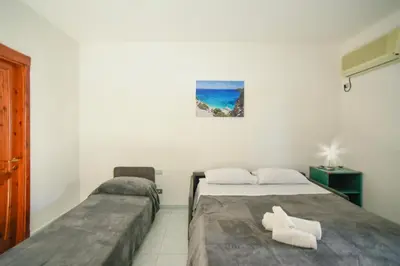 Letto o letti in una camera di Su Nenneri Beach Apartment