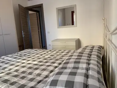 Letto o letti in una camera di Giulian apartment