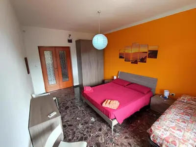 Letto o letti in una camera di Casa Sonia