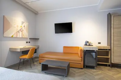 TV o dispositivi per l'intrattenimento presso Lu' Hotel Carbonia