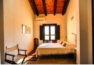 Letto o letti in una camera di La Peonia