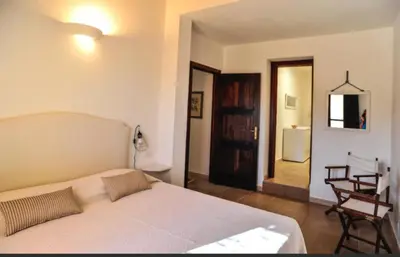 Letto o letti in una camera di La Peonia