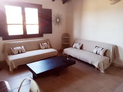 Letto o letti in una camera di La Peonia