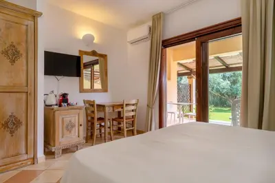 TV o dispositivi per l'intrattenimento presso Porto Giunco Residence
