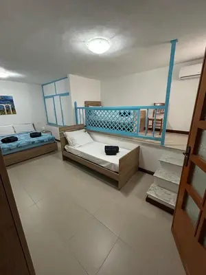Letto o letti in una camera di Villa Nicanda- 100 MT dal mare- giardino