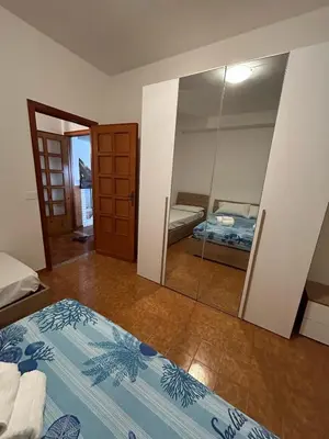 Letto o letti in una camera di Villa Nicanda- 100 MT dal mare- giardino