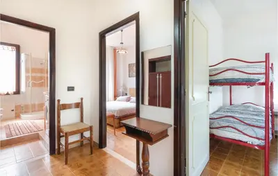 Letto o letti in una camera di Casa Jole