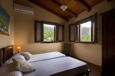 Letto o letti in una camera di TerreMesu Eco Country House with Pool 6 10 Guests near Costa Rei Castiadas