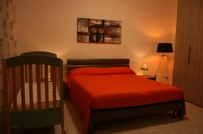 Letto o letti in una camera di La casa dei nonni