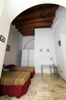 Letto o letti in una camera di Città Antica