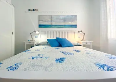 Letto o letti in una camera di Stella Marina