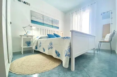 Letto o letti in una camera di Stella Marina