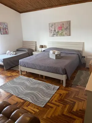 Letto o letti in una camera di B&B da Antonella