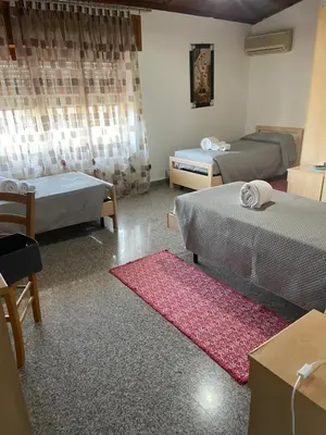 Letto o letti in una camera di B&B da Antonella
