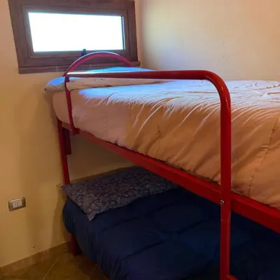 Letto o letti in una camera di Casa Ottema
