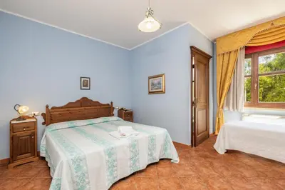 Letto o letti in una camera di Hotel Funtana Noa