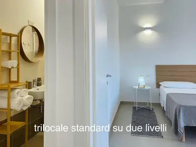 Letto o letti in una camera di Appartamenti Shardana