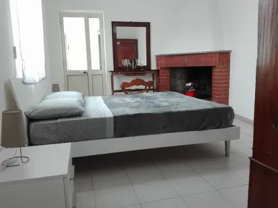 Letto o letti in una camera di casa vacanza laguna