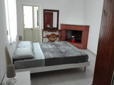 Letto o letti in una camera di casa vacanza laguna