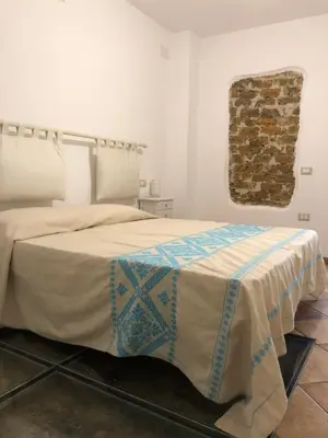 Letto o letti in una camera di Casa della Nonna