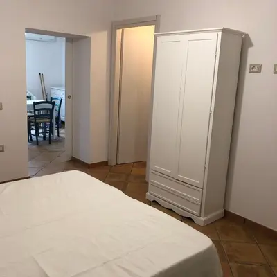 Letto o letti in una camera di Casa della Nonna