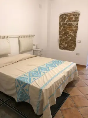 Letto o letti in una camera di Casa della Nonna