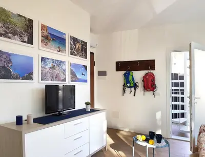 TV o dispositivi per l'intrattenimento presso Casa Olivastro Vista Mare