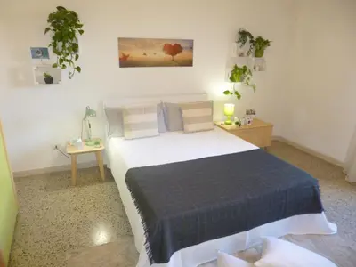 Letto o letti in una camera di EcoBoutique house, self check-in - free car parking