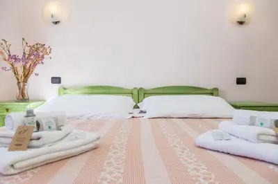 Letto o letti in una camera di Hotel Janas