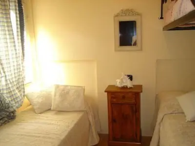 Letto o letti in una camera di Villa Stella