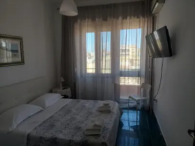 Letto o letti in una camera di Domus Dejanas - Appartamento 180 mq a Quartu