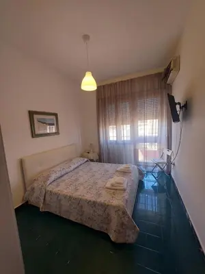 Letto o letti in una camera di Domus Dejanas - Appartamento 180 mq a Quartu
