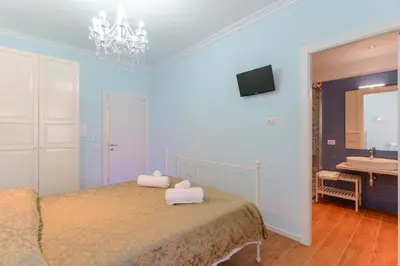 Letto o letti in una camera di Al Teatro Lirico