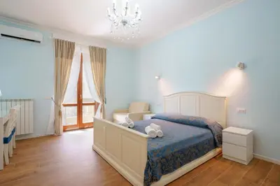 Letto o letti in una camera di Al Teatro Lirico