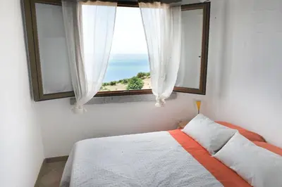 Letto o letti in una camera di Arromaniu