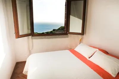 Letto o letti in una camera di Arromaniu