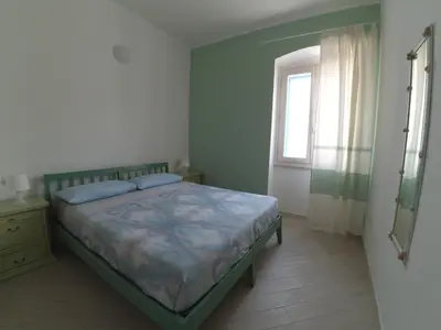 Letto o letti in una camera di Alemar Casa Vacanze