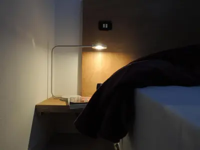 Letto o letti in una camera di Casa Anna