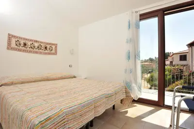 Letto o letti in una camera di Casa Bianco Navarrese B